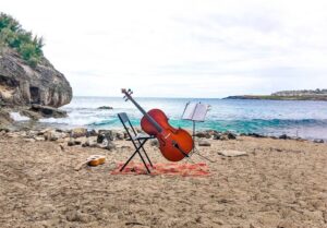 cello on beach
